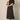 Black Linen Cargo Skirt by Pcill at 6Whiskey, six whiskey, pockets, back elastic waistband, cool girl, elegant western, casual, breathable, tailored, concert, dinner date, night out, matching set. Front view.