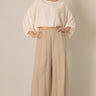 Cropped Linen Top by 6whiskey, six whisky, long sleeve, puff sleeve, round neck, cropped, breathable, effortless, sophisticated, polished, stylish, chic, work wear, casual, fall, women's fashion. Front view.