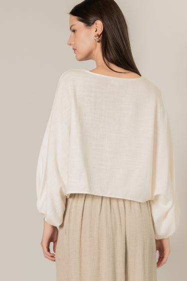 Cropped Linen Top by 6whiskey, six whisky, long sleeve, puff sleeve, round neck, cropped, breathable, effortless, sophisticated, polished, stylish, chic, work wear, casual, fall, women's fashion. Back view.