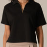 Black Half Zip Top by Pcil at 6Whiskey, six whisky, short sleeve, quarter zip neckline, gold zipper detail, soft, comfortable, cropped, relaxed, loungewear, errands, at home, matching set. Front view.