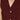 Close-up of a burgundy sleeveless top with gold buttons and a necklace.