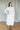 Rosabella Midi Dress in Vintage Ivory at 6Whiskey six whisky by cleobella cream waisted collared button down work dress work weat midi long sleeve fit and flare 