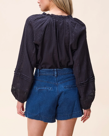 Alicia Blouse in Black by Cleobella at 6Whiskey, six whisky, long sleeve, balloon sleeve, lace, ruffled neckline, neck, button closure on the front, lunch outfit, market, errands, casual western, western inspired, elegant, classy, southern, texas, lone star, womens clothing, womens fashion, timeless, back view.