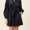 Ivana Mini Dress by Cleobella at 6Whiskey, six whisky, puff sleeves, pockets, lightweight, breezy, elevated, timeless, classy, southern, work wear, lunch date, day to night, date night, western, tie front, split neck, ruffled detailing, puff sleeve, mini dress, short dress, black dress, front view.