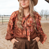 Heirloom Floral Blouse at 6Whiskey, six whisky, bow detail at the neck, lightweight, breathable, front buttons, ruffle detail, smocked cuff, billowy sleeves, long sleeve blouse, spring summer top, women's elevated western, chic, work outfit, work to weekend, church outfit, NFR, stockyards night out, easter blouse, front view