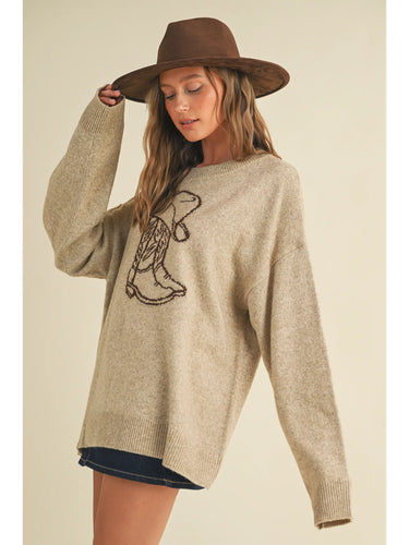 Rodeo Knit Pullover at 6Whiskey, six whiskey, round neckline, crewneck, ribbed hemline, oversized, neutral beige, dark brown, boot graphic, country, western, casual, rodeo, country, country concert, lunch date, market, errands, layer, fall, winter, cooler weather, front view.