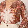 Pink Paisley Blouse at 6whiskey cleobella soft pink and rust paisley print, long sleeve, raglan sleeve, ruffle details, button loop front, mini side slits, relaxed fit, organic cotton, bra friendly, women's top, vintage boho style.