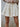 Tiered Corduroy Skirt at 6Whiskey, six whiskey, cotton blend, woven, flowy, elastic waist band, mini, aggie, aggie game day, game day, SEC, football, tailgate. Front view.