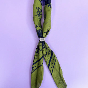 Southwest Bandana Bowtie Slide at 6Whiskey, six whisky, bandana accessory, scarf accessory, ring, sterling silver, etched lifework, sunburst centrepiece, eye-catching, western, modern western, trendy accessory, unique, artful, artisan, texas, lone star lifestyle, country, rodeo, country concert, front view