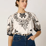 Kinsley Blouse by Cleobella at 6Whiskey, six whisky, short sleeves, puff sleeve, balloon sleeve, western floral print, roses, leaves, black and white, cream, button back, lightweight, versatile, transition piece, elevated western, classy, chic. Front view. 