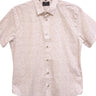 Mesa Short Sleeve at 6Whiskey six whisky. A cream short-sleeve button-down shirt with a subtle, multicolor micro-print pattern, displayed on a hanger against a white background.