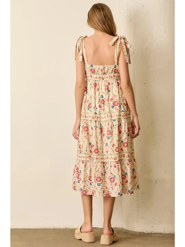 Saddle Bloom Maxi Dress at 6Whiskey, six whisky, pattern change, tiered, straight neck, tie bow detail, flowy, breathable, summer, spring, feminine, casual, western, vintage floral, rodeo, country, lunch, brunch, everyday warm weather dress, modest, women's fashion, modern casual western, southern charm, pink, blue, green, beige, yellow, back view