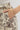 Lucky Draw Skort at 6whiskey, six whisky, southwestern print, cream and black, side tie, pockets, built-in shorts, comfortable, casual, western, versatile, aggie game day, SEC, tailgates, texas a&m, country concerts. Detail view.