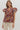 Maroon Meadow Top at 6Whiskey, six whisky, short sleeves, ruffle sleeves, beige contrast piping, button closure, pleated, split neck, feminine, botanical design, floral, flowers, greenery, orange, green, purple, flattering, casual, everyday, tamu, texas a&m, gameday, tailgate, lunch date, front view