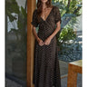 Stella Polka Dot Maxi Dress at 6Whiskey, six whisky, ruffle sleeves, v-neckline, tie detail, dark brown, espresso brown, white polka dots, casual western dress, throw on and go, rodeo, fall, winter, lunch date, SEC gameday, versatile dress, front view. 