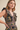 Midnight Garden Dress at 6Whiskey six whisky, panel, geometric, floral, patterned, purple, navy, yellow, orange, green, split neckline, v-neck, sleeveless, ruffle sleeve, ruffle hem, smocked back, feminine fit, flattering, romantic, dramatic, bold, eye-catching, edgy western, cool girl, eclectic, elevated, women's dress, midi dress, women's clothing, fashion, ruffle detail side view