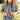 Down south twilly at 6whiskey, six whisky, Texas A&M maroon burgundy western icon graphic, maroon and white, soft, lightweight, breathable, comfortable, accessory, scarf, twilly, ribbon, gameday, tailgating, football, SEC, western, casual. Front view. Woman wearing denim and twilly around neck. Tie on neck, wrist, beltloops, or on purse. Aggie style and gameday outfit inspo. Horseshoe, boots, bucking horse and cowboy.