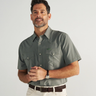 Short Sleeve Performance Pearl Snap in Cactus green by Tecovas at 6Whiskey, six whisky, collar, western yolk stitching, ventilation, UV proof, UPF protection, sweat proof, stretchy, moves with you, comfortable, spring, summer, short sleeves, keeps you cool, warm weather top, date night, rodeo, work, everyday, elevated western, stylish, modern western, refined, dark blue, sunglass pocket, front view.