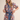 Floral Pop Romper at 6Whiskey, six whisky, short sleeves, puff sleeves, adjustable waistband, comfortable, casual, casual western, vintage floral, whimsical floral, contrast front placket, button down detail, split neck, v-neck, lightweight, breathable, navy blue, pink yellow, white, red, orange, spring summer, front view