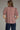 Gridiron gingham blouse at 6whiskey, six whisky, woman wearing a burgundy maroon gingham print blouse with jeans, ideal for fall game day or tailgate looks at texas a&m, aggies, SEC, gameday outift inspo, elasticated gathered mid length sleeve blouse, ruffle detail neck, back view, football game outfit, watch party look, game day to everyday look. Pair with black, white, or blue jean denim or aggie accessories and sneakers, sandals, or boots. Texas A&M aggie style. Casual chic aggie style. 
