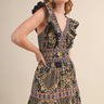 Midnight Garden Dress at 6Whiskey six whisky, panel, geometric, floral, patterned, purple, navy, yellow, orange, green, split neckline, v-neck, sleeveless, ruffle sleeve, ruffle hem, smocked back, feminine fit, flattering, romantic, dramatic, bold, eye-catching, edgy western, cool girl, eclectic, elevated, women's dress, midi dress, women's clothing, fashion, front view