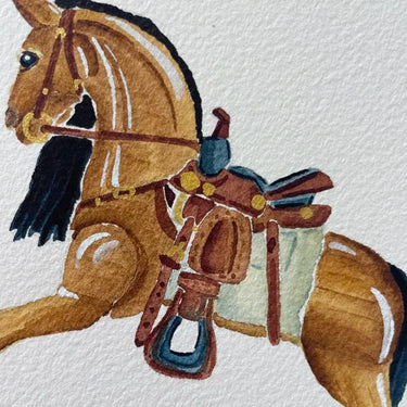 Rocking Horse Art Print by Catherine Cartie at 6Whiskey, six whisky, handprinted, watercolour, Carmel brown horse, dark main, saddle, vintage, western, pony, dusty blue, unframed, art decor, home decor, nursery, children, nostalgia, childhood, playful, Detail view. 