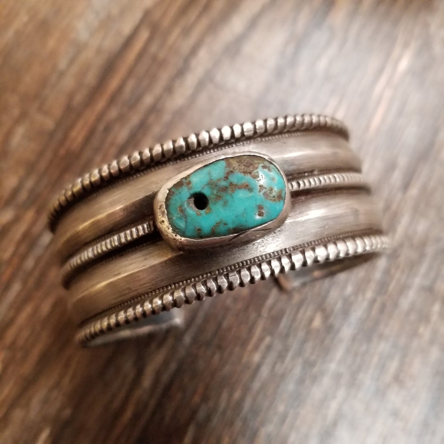 Load image into Gallery viewer, Vintage Coin Silver Cuff w/ Turquoise Trader Bead
