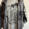 Grey graphic tshirt with black letters and cowboy saying stick to your guns short sleeve at 6Whiskey six whisky mens or womens bella canvas soft tee