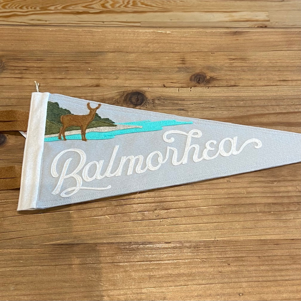 Balmorhea Texas State Park Handmade Felt Pennant at 6Whiskey six whisky in color grey featuring a deer and water
