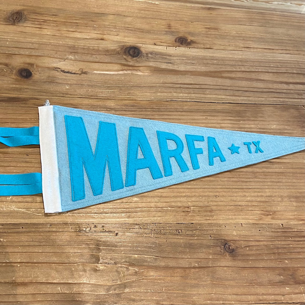 Load image into Gallery viewer, Marfa Texas Handmade Felt Pennants at 6Whiskey six whisky in color blue on blue tonal

