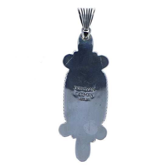 Load image into Gallery viewer, Back view of sterling silver pendant by artist Donovan Miller spiney orange oyster and carico lake turquoise six whisky
