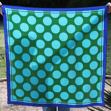 Dottie West Scarf at 6Whiskey, six whisky, square scarf, silk, satin, soft, breathable, warm weather, chic, elevated western, polka dots, green, light blue, dark blue, contrast boarder, long scarf, belt, hat accessory, bag accessory, playful, bold, polished, eye-catching, year-round, spring, summer, front view.
